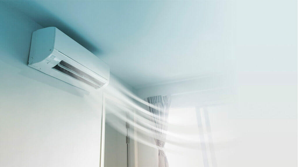 Un aire acondicionado de ventana en una habitación.